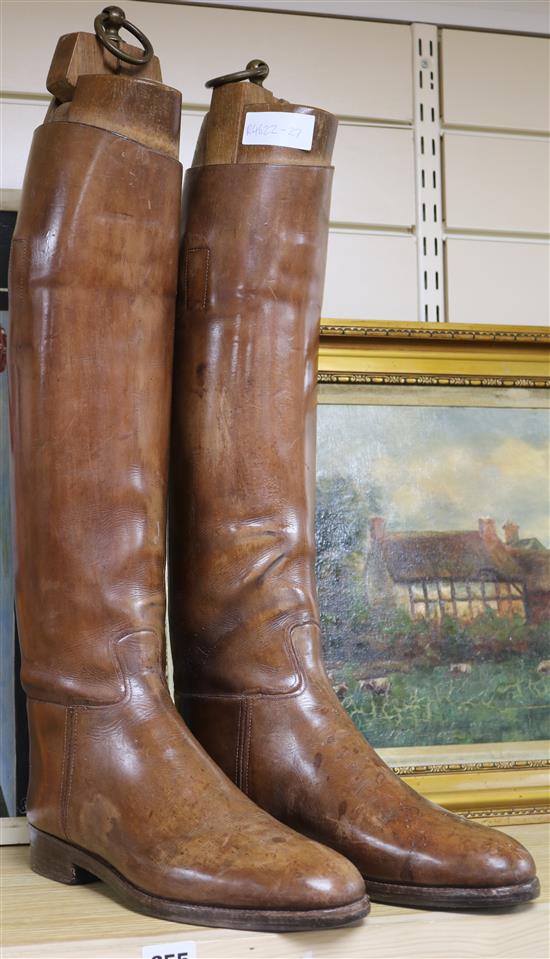 A pair of Victorian gentlemans brown leather riding boots, with stretchers